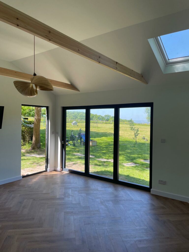 Indoor of a family annex with sliding windows
